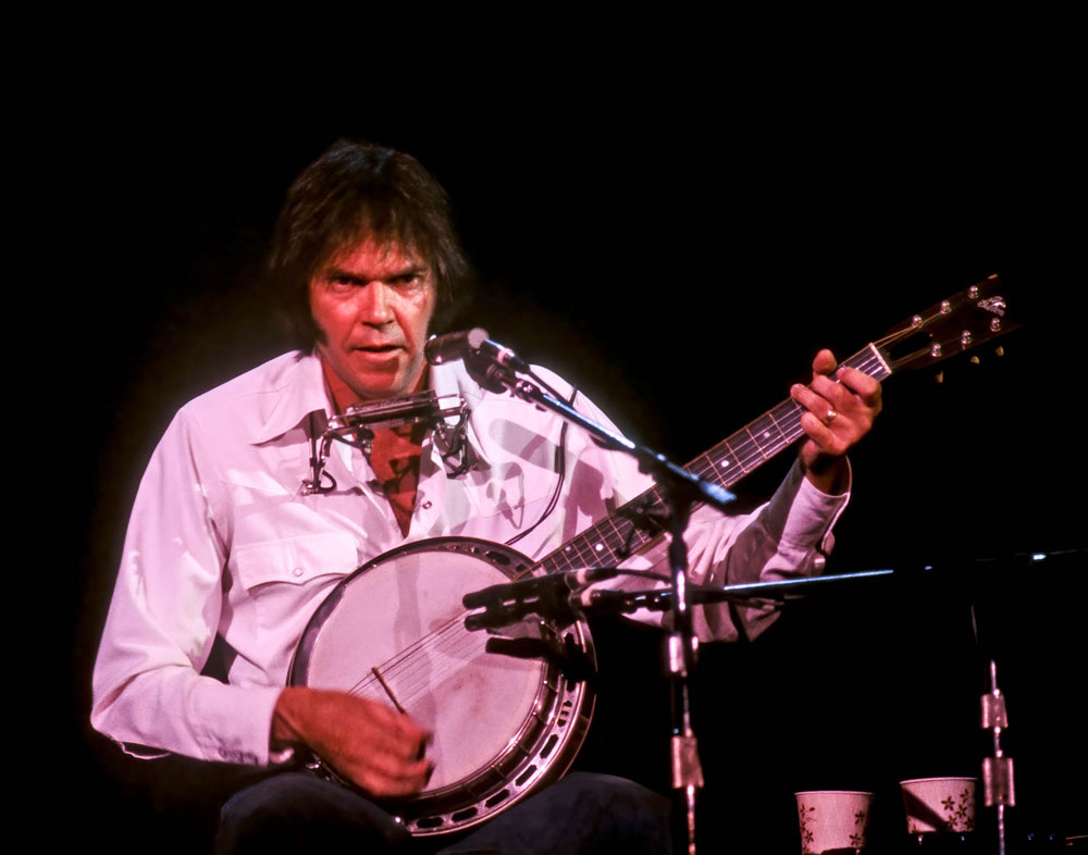 “Neil Young, Seattle Center Coliseum, 7.28.83” Steve Schneider Color photo 11x14”